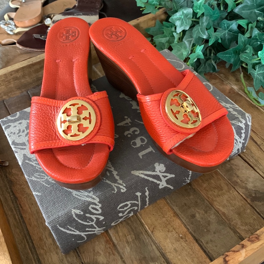 Tory Burch wedge bright orange sandals, with gold colored emblem .Size 7